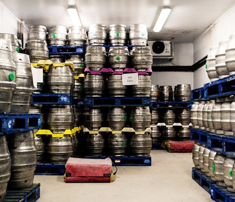 beer kegs in storage that are being temperature monitored